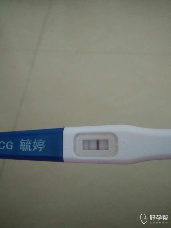 请问一下这是不是怀孕了?有一条不是很明显.