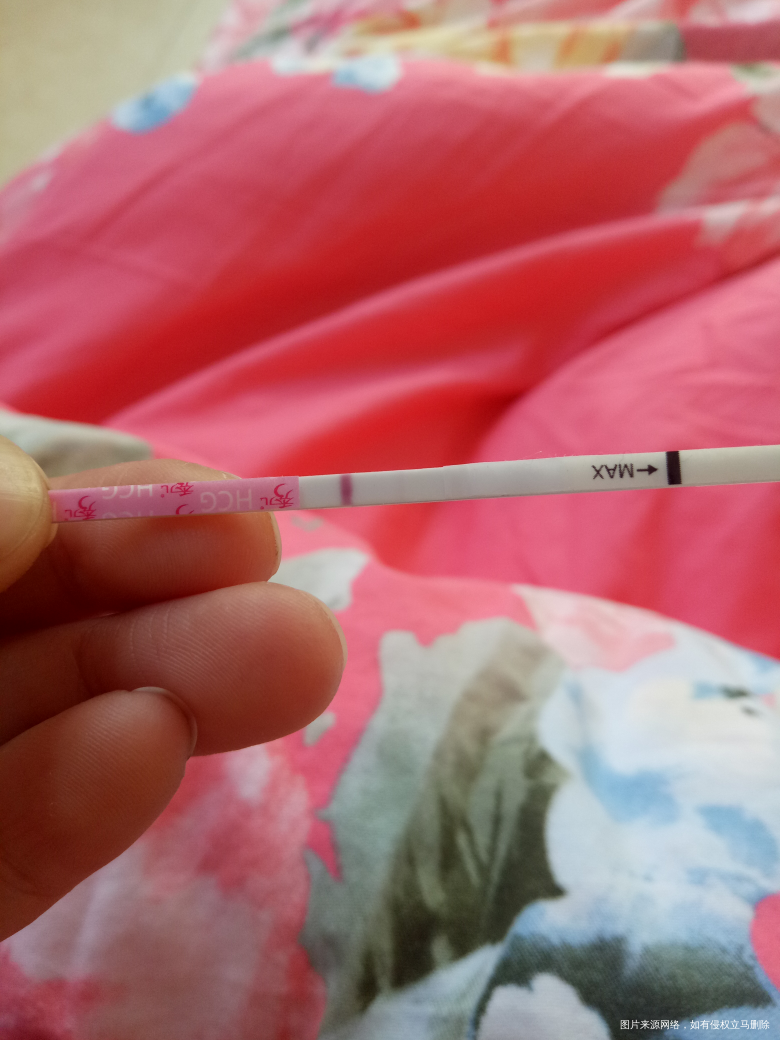 移植囊胚第七天。出褐色血