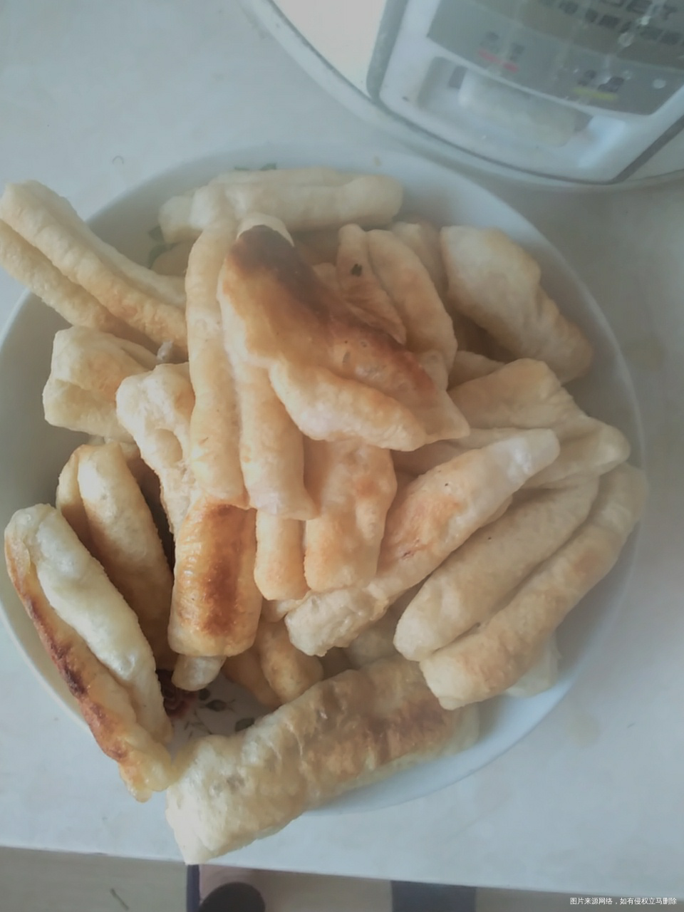 炸点小油条吃吃,有点咸了