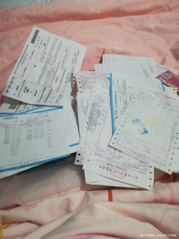 看着一堆的检查单,发票单,心里好难受