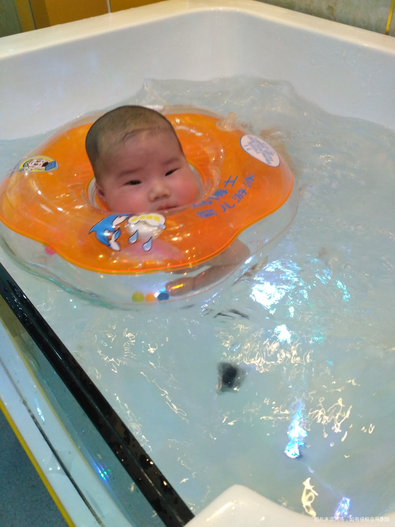 宝贝100天了,理个大光头