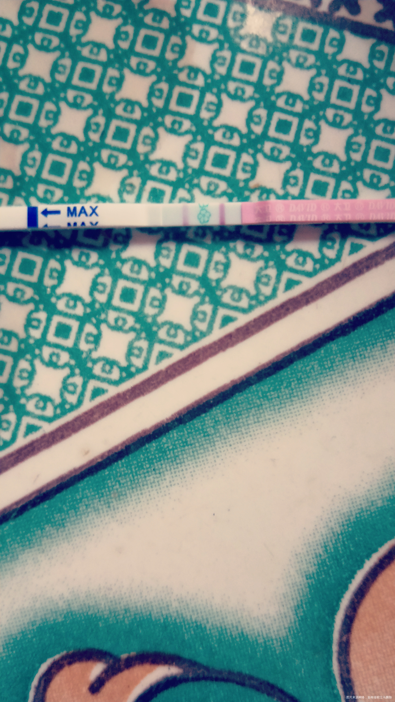 大家帮我看看,这是前两天测的,算不算阳性
