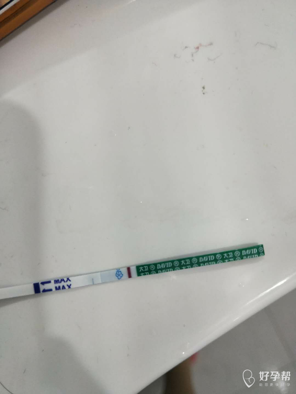 进来帮我看看测孕纸有没有印