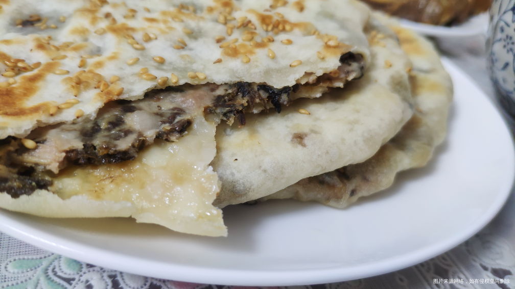 今天的早饭,梅干菜猪肉饼