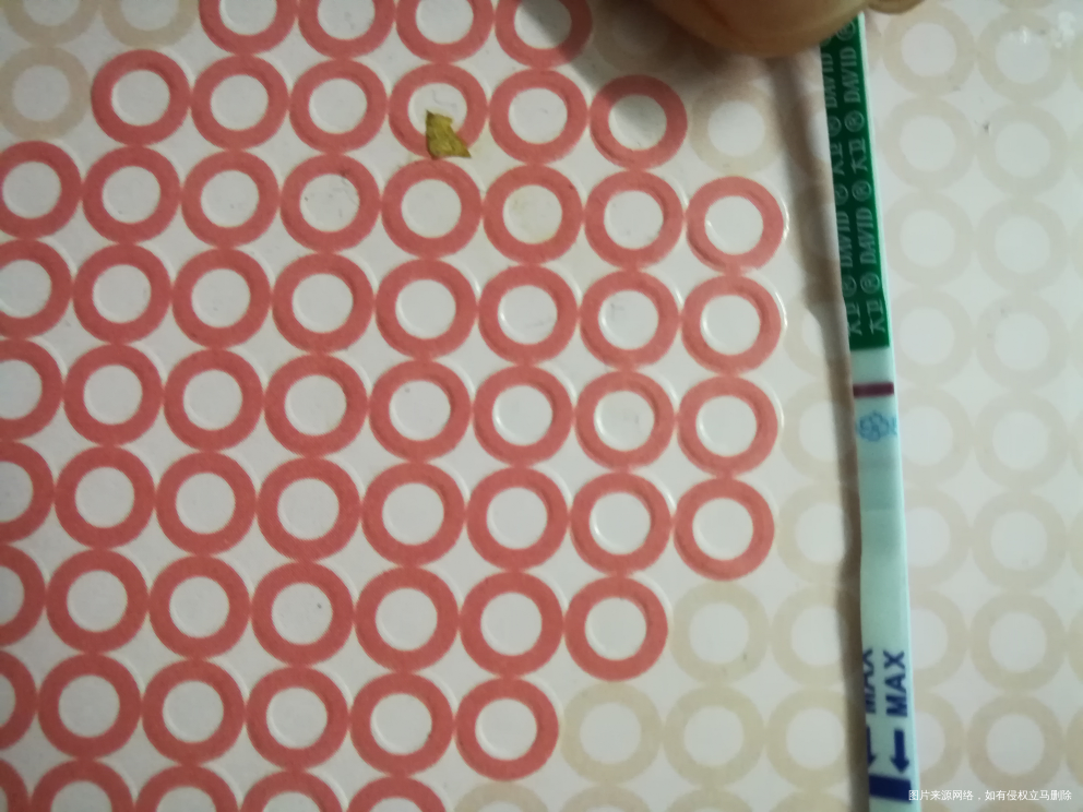 大家帮我看看,有印吗?还是光线问题?