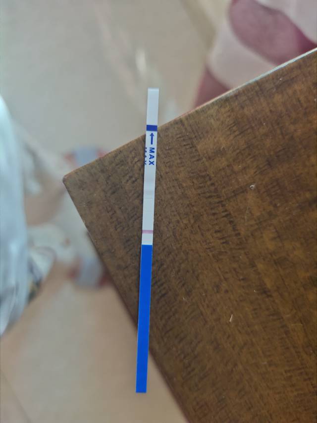 我是过年上午打的破卵针今天测了一下早孕试纸这